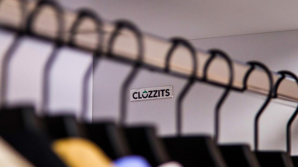clozzits logo in a closeup of hangers